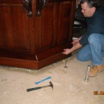 Removal of trapped carpet under a bar